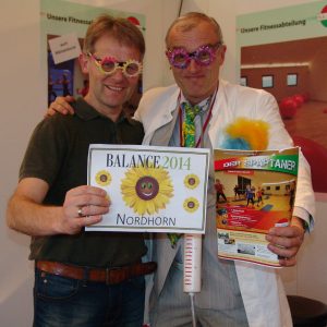 Der lustige Spass-Fotograf "Felix" als witziger Arzt (Comedy-Walkact) (rechts)